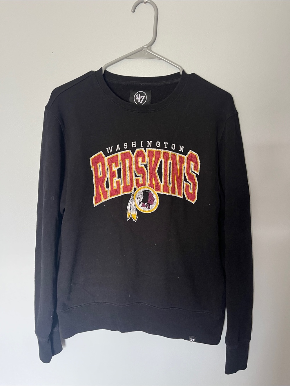47 Black Crewneck Sweatshirt with Red and Gold Team Appliqué